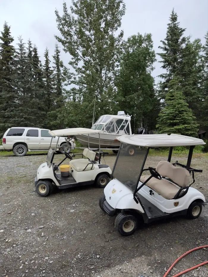 Golf carts parked at camp