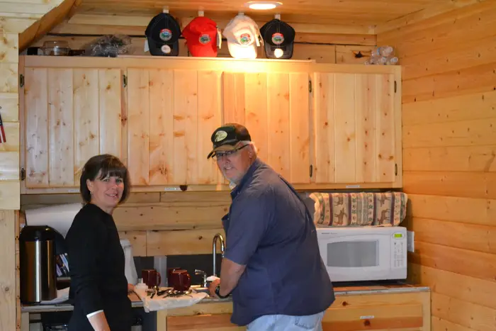 Cooking in the lodge kitchen, plates and coffee going