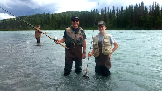 Group of women anglers wading and fishing the river together.