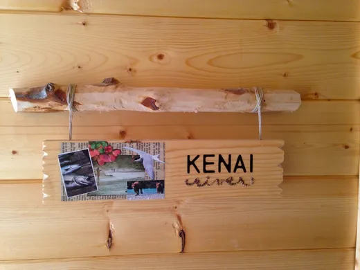 Kenai sign and welcome display at the fishcamp entrance.