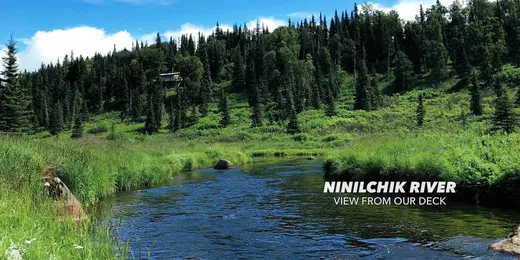 Shallow river bend through spruce forest with text overlay 'Mulchatna River'
