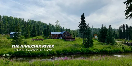 Wide braided river view through Alaska wilderness with text overlay