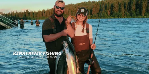 Anglers with a catch on the water, river in background