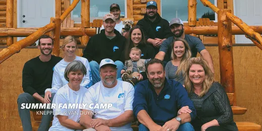 Staff or crew group photo inside the lodge