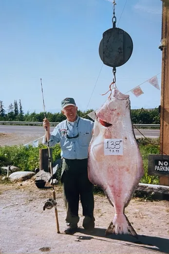 Large salmon weighed on the dock scale