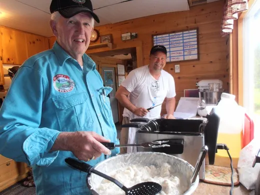 Guest checking in at the lodge counter