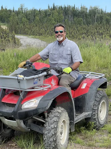 Guest riding ATV on the property